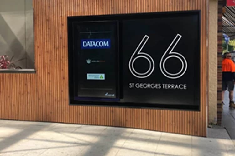 High brightness display readable through glass in a commercial building frontage
